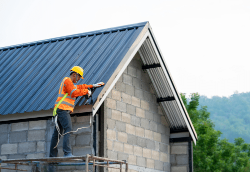 Immeuble en construction par un particulier, soumis à la TVA de la livraison à soi-même.